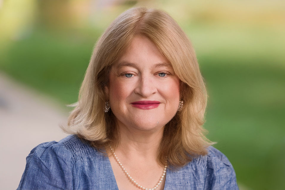 Meg Connolly A headshot photo of Meg Connolly outside on campus.