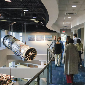 Cincinnati Trek 2025 Students at GE Aerospace looking at engine displays.