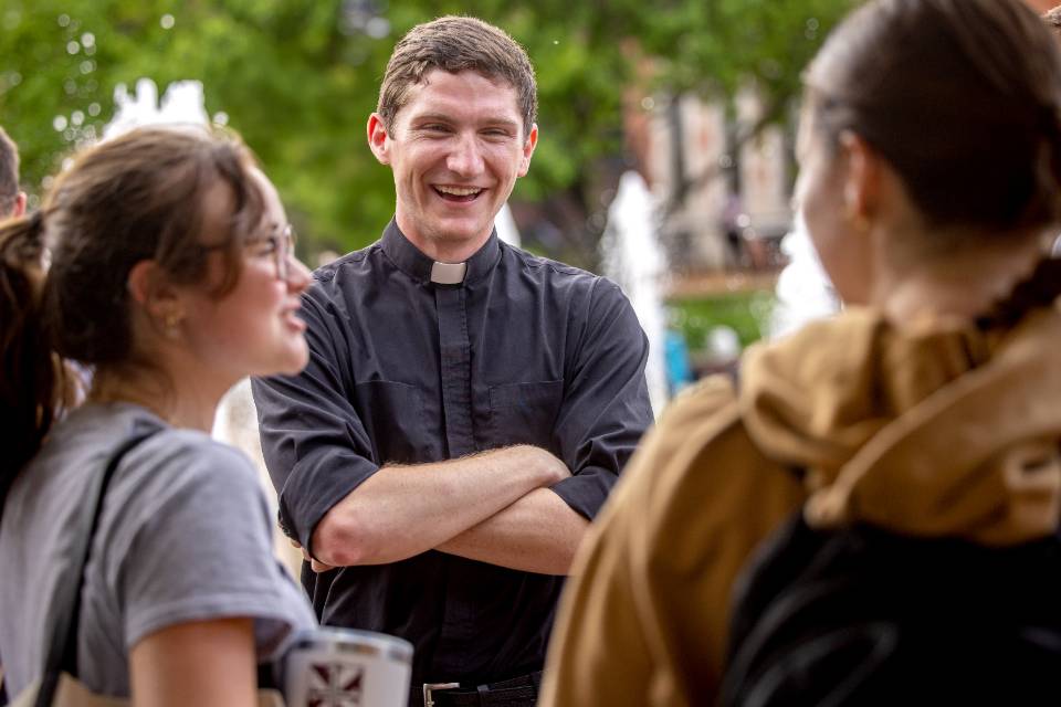 Chris Ross enjoys java with students